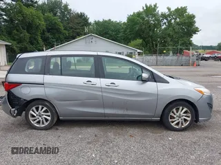 2014 Mazda 5 Sport z VIN JM1CW2BL5E0172594, wystawiony jako IAAI lot #42628707 z przebiegiem 180 369 mil mil oraz . Historia ofert i sprzedaży dostępna na DreamBid. Obrazek 14.