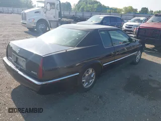 2002 Cadillac Eldorado ESC with VIN 1G6EL12YX2B105502, listed as a IAAI auction lot 42121952 with 110,261 mi miles. Bid and sale history available at carsss.com. Image 4.
