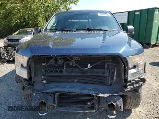 2015 Ford F-150 XLT with VIN 1FTEW1EP7FKE12574, listed as a Copart auction lot 59519985 with 133,337 mi miles and Salvage title. Bid and sale history available at DreamBid. Image 5.