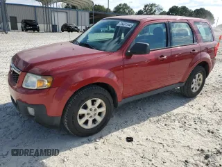 2011 Mazda Tribute Touring with VIN 4F2CY0C7XBKM00671, listed as a Copart auction lot 75431144 with 140,748 mi miles and Clean Title. Bid and sale history available at carsss.com. Image 1.