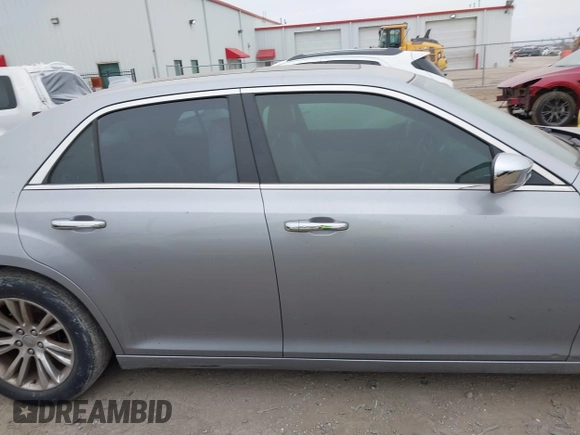 2015 Chrysler 300 C with VIN 2C3CCAEG0FH779540, listed as a IAAI auction lot 41542982 with 211,348 mi miles and . Bid and sale history available at carsss.com. Image 13.