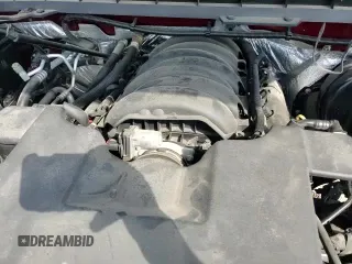 2018 Chevrolet Silverado 1500 LT z VIN 3GCUKREC4JG155439, wystawiony jako Copart lot #86126245 z przebiegiem 125 987 mil mil oraz Szkoda całkowita • Salvage title. Historia ofert i sprzedaży dostępna na DreamBid. Obrazek 13.