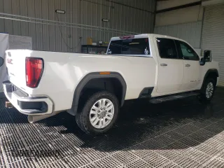 2020 GMC Sierra 3500HD Denali z VIN 1GT49WEY2LF317238, wystawiony jako Copart lot #51967295 z przebiegiem 125 681 mil mil oraz Szkody całkowita. Historia ofert i sprzedaży dostępna na DreamBid. Obrazek 3.