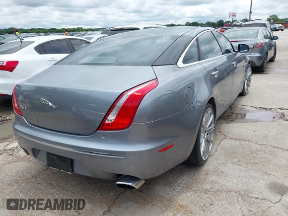 2012 Jaguar XJ XJL with VIN SAJWA2GB5CLV23903, listed as a IAAI auction lot 42486443 with 109,691 mi miles and . Bid and sale history available at DreamBid. Image 4.