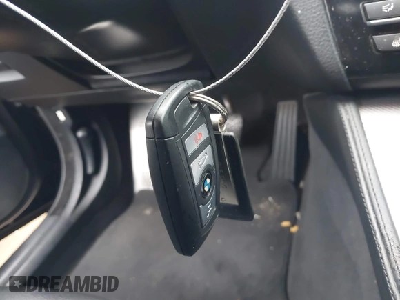 2014 BMW 5 Series 535i with VIN WBA5B1C50ED481703, listed as a IAAI auction lot 41856996 with 105,057 mi miles and . Bid and sale history available at DreamBid. Image 11.