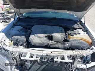 2016 Chrysler 300 Anniversary Edition with VIN 2C3CCAAG7GH313739, listed as a IAAI auction lot 41833824 with 285,806 mi miles and . Bid and sale history available at DreamBid. Image 10.