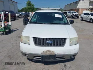 2006 Ford Freestyle SE z VIN 1FMZK01186GA55123, wystawiony jako IAAI lot #42583107 z przebiegiem 142 586 mil mil oraz . Historia ofert i sprzedaży dostępna na DreamBid. Obrazek 12.