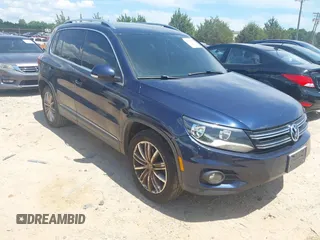 2012 Volkswagen Tiguan SE with VIN WVGAV7AX7CW534703, listed as a IAAI auction lot 42463358 with 119,699 mi miles and . Bid and sale history available at DreamBid. Image 1.