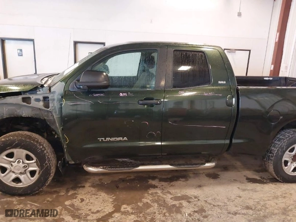 2011 Toyota Tundra 4WD Truck with VIN 5TFUY5F12BX173049, listed as a IAAI auction lot 41552652 with NaN miles. Bid and sale history available at carsss.com. Image 14.