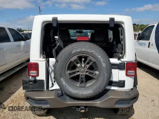 2016 Jeep Wrangler Unlimited Sahara with VIN 1C4BJWEG1GL328101, listed as a Copart auction lot 52754865 with 65,106 mi miles and Salvage title. Bid and sale history available at DreamBid. Image 6.