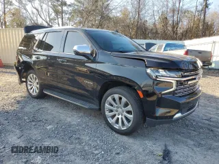 2021 Chevrolet Tahoe Premier with VIN 1GNSKSKD9MR321669, listed as a Copart auction lot 43282815 with 59,648 mi miles and Salvage title. Bid and sale history available at DreamBid. Image 4.
