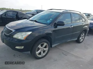 2008 Lexus RX with VIN 2T2HK31U38C064322, listed as a IAAI auction lot 42074366 with 241,459 mi miles. Bid and sale history available at carsss.com. Image 17.