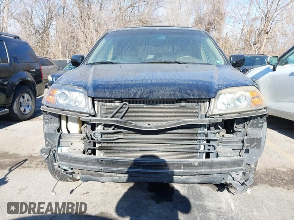 2005 Acura MDX Touring with VIN 2HNYD18985H520296, listed as a IAAI auction lot 41133862 with 173,318 mi miles. Bid and sale history available at carsss.com. Image 6.