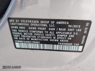 2013 Volkswagen Passat TDI SE w/Sunroof with VIN 1VWBN7A32DC125952, listed as a IAAI auction lot 40505763 with 149,055 mi miles. Bid and sale history available at carsss.com. Image 9.