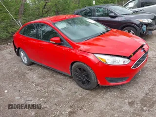 2016 Ford Focus SE z VIN 1FADP3F23GL285640, wystawiony jako IAAI lot #42066370 z przebiegiem 97 007 mil mil oraz . Historia ofert i sprzedaży dostępna na DreamBid. Obrazek 1.