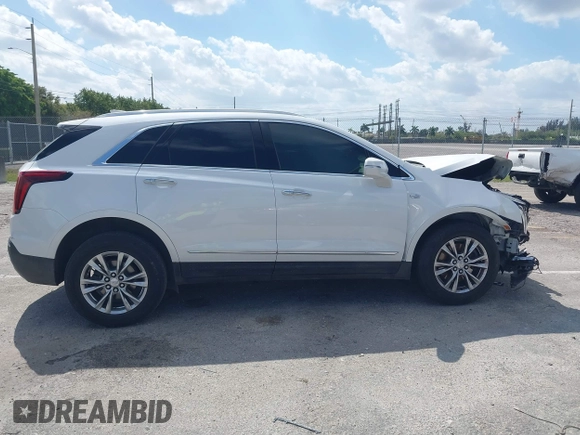2020 Cadillac XT5 Premium Luxury FWD with VIN 1GYKNCRS7LZ129119, listed as a IAAI auction lot 41710878 with 52,575 mi miles and . Bid and sale history available at carsss.com. Image 13.