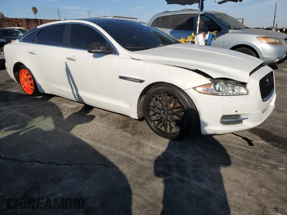 2014 Jaguar XJ with VIN SAJWA2GZ9E8V71794, listed as a Copart auction lot 74347574 with 106,172 mi miles and Clean Title. Bid and sale history available at carsss.com. Image 4.