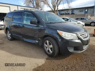 2011 Volkswagen Routan SE with VIN 2V4RW3DGXBR642528, listed as a Copart auction lot 45082055 with 167,067 mi miles and Salvage title. Bid and sale history available at DreamBid. Image 4.