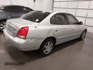 2002 Hyundai Elantra GLS z VIN KMHDN45D12U428589, wystawiony jako IAAI lot #42135566 z przebiegiem 133 479 mil mil oraz . Historia ofert i sprzedaży dostępna na DreamBid. Obrazek 4.