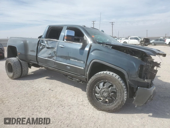 2019 GMC Sierra 3500HD Denali z VIN 1GT42WEY6KF163720, wystawiony jako Copart lot #56526725 z przebiegiem Nie podano mil oraz Szkody całkowita. Historia ofert i sprzedaży dostępna na DreamBid. Obrazek 4.