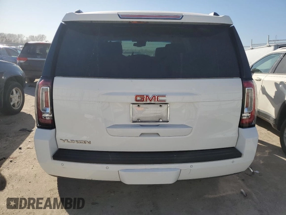 2015 GMC Yukon SLT z VIN 1GKS2BKC9FR539411, wystawiony jako Copart lot #48336835 z przebiegiem 176 994 mil mil oraz Szkoda całkowita • Salvage title. Historia ofert i sprzedaży dostępna na DreamBid. Obrazek 6.