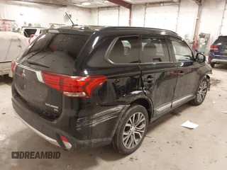 2016 Mitsubishi Outlander SE with VIN JA4AZ3A35GZ037422, listed as a IAAI auction lot 41504909 with 115,242 mi miles and . Bid and sale history available at DreamBid. Image 4.