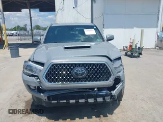 2019 Toyota Tacoma SR with VIN 3TMCZ5AN1KM274625, listed as a IAAI auction lot 42660593 with 163,460 mi miles and . Bid and sale history available at DreamBid. Image 12.