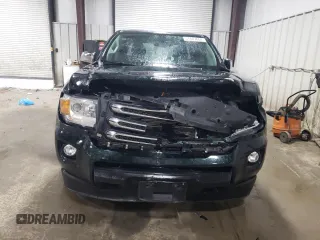 2015 GMC Canyon 4WD SLE with VIN 1GTG6BE38F1258880, listed as a Copart auction lot 57887664 with 142,346 mi miles and Salvage Title. Bid and sale history available at carsss.com. Image 5.