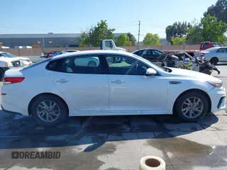 2019 Kia Optima LX with VIN 5XXGT4L33KG324175, listed as a IAAI auction lot 42139795 with 105,273 mi miles. Bid and sale history available at carsss.com. Image 13.