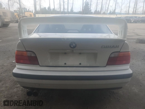 1997 BMW 3 Series 328is with VIN WBABG1326VET03587, listed as a Copart auction lot 41882135 with 231,287 mi miles and Salvage Title. Bid and sale history available at carsss.com. Image 6.