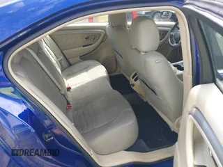 2013 Ford Taurus SE z VIN 1FAHP2D85DG153020, wystawiony jako IAAI lot #42307906 z przebiegiem 198 626 mil mil oraz . Historia ofert i sprzedaży dostępna na DreamBid. Obrazek 8.