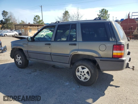 1995 Jeep Grand Cherokee Laredo with VIN 1J4GZ58S9SC706256, listed as a Copart auction lot 46635685 with 388,975 mi miles and Salvage Title. Bid and sale history available at carsss.com. Image 2.