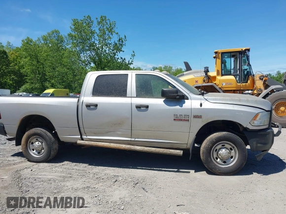 2014 Ram 2500 Tradesman z VIN 3C6TR5CT7EG186099, wystawiony jako IAAI lot #42317585 z przebiegiem 309 687 mil mil oraz . Historia ofert i sprzedaży dostępna na DreamBid. Obrazek 13.
