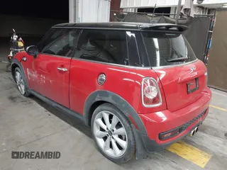 2013 MINI Hardtop S with VIN WMWSV3C50DT392160, listed as a IAAI auction lot 41893232 with 70,922 mi miles and . Bid and sale history available at DreamBid. Image 3.