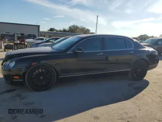 2012 Bentley Flying Spur z VIN SCBBP9ZAXCC076268, wystawiony jako Copart lot #77854304 z przebiegiem 99 103 mil mil oraz Tytuł czysty. Historia ofert i sprzedaży dostępna na DreamBid. Obrazek 1.