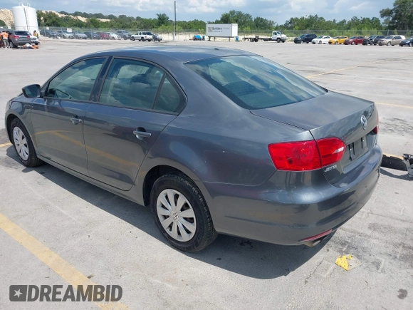 2014 Volkswagen Jetta S with VIN 3VW2K7AJ0EM217942, listed as a IAAI auction lot 42665485 with 140,084 mi miles and . Bid and sale history available at DreamBid. Image 3.