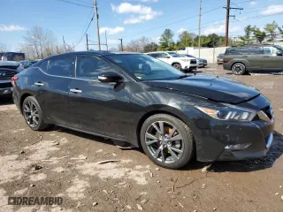 2018 Nissan Maxima S with VIN 1N4AA6AP1JC383517, listed as a Copart auction lot 50235755 with 164,199 mi miles and Salvage Title. Bid and sale history available at carsss.com. Image 4.