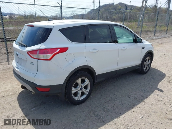 2014 Ford Escape SE with VIN 1FMCU9GXXEUC50365, listed as a IAAI auction lot 41891030 with 70,399 mi miles. Bid and sale history available at carsss.com. Image 4.