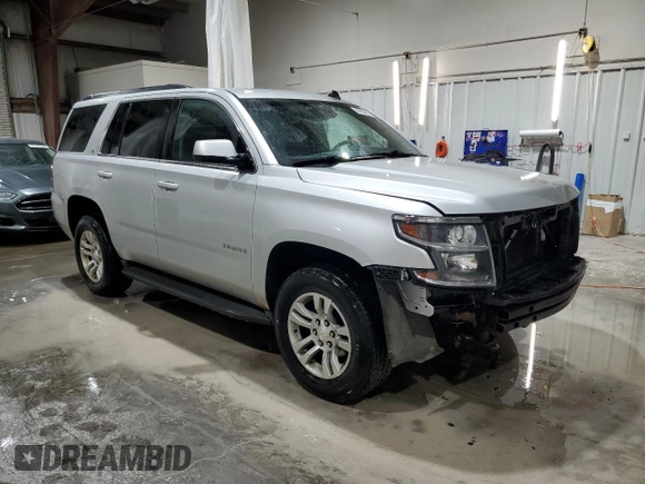 2015 Chevrolet Tahoe LT with VIN 1GNSKBKC1FR234889, listed as a Copart auction lot 60786475 with 255,271 mi miles and Salvage title. Bid and sale history available at DreamBid. Image 4.