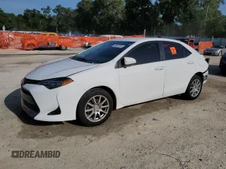 2019 Toyota Corolla L z VIN 5YFBURHE0KP905297, wystawiony jako Copart lot #59600395 z przebiegiem 140 291 mil mil oraz Nie do naprawy • Non repairable. Historia ofert i sprzedaży dostępna na DreamBid. Obrazek 1.