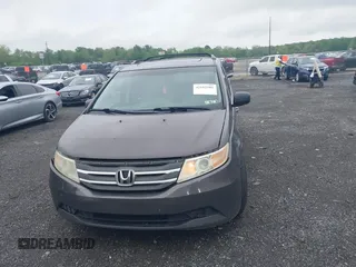 2012 Honda Odyssey EX-L with VIN 5FNRL5H64CB060468, listed as a IAAI auction lot 42182501 with 236,399 mi miles and . Bid and sale history available at carsss.com. Image 12.