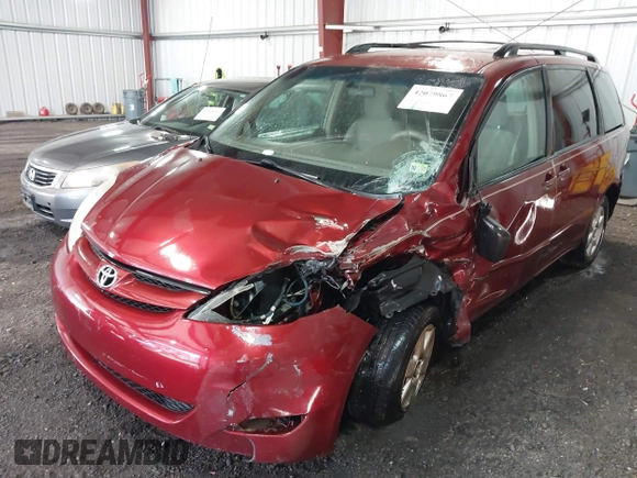 2009 Toyota Sienna CE with VIN 5TDZK23C89S265150, listed as a IAAI auction lot 42079867 with 211,467 mi miles. Bid and sale history available at carsss.com. Image 6.
