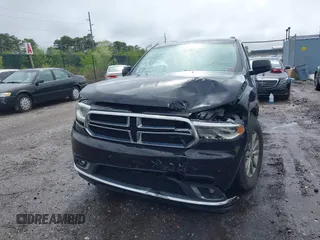 2018 Dodge Durango SXT with VIN 1C4RDJAG7JC111383, listed as a IAAI auction lot 42197826 with 140,863 mi miles and . Bid and sale history available at DreamBid. Image 6.