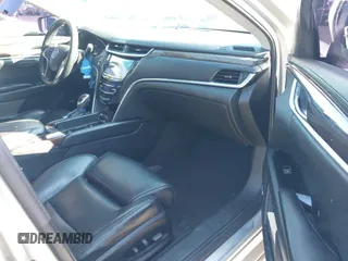 2013 Cadillac XTS Luxury z VIN 2G61R5S31D9185009, wystawiony jako IAAI lot #41243001 z przebiegiem 161 219 mil mil oraz . Historia ofert i sprzedaży dostępna na DreamBid. Obrazek 5.