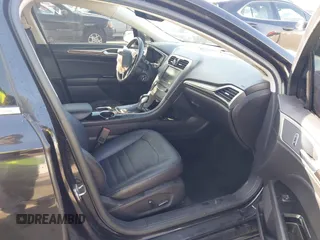 2013 Ford Fusion SE Hybrid with VIN 3FA6P0LU4DR325699, listed as a IAAI auction lot 41677237 with 129,004 mi miles. Bid and sale history available at carsss.com. Image 5.