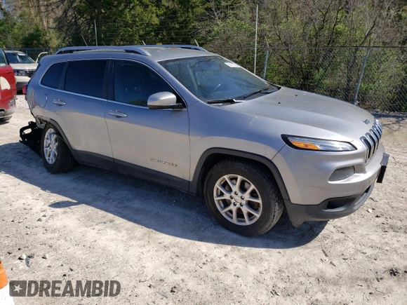 2014 Jeep Cherokee Latitude with VIN 1C4PJMCS0EW200588, listed as a Copart auction lot 54171255 with 196,247 mi miles and Salvage Title. Bid and sale history available at DreamBid. Image 4.