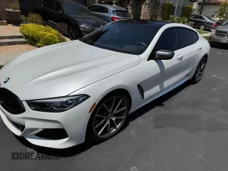2020 BMW 8 Series M850i with VIN WBAGV8C01LBP48613, listed as a Copart auction lot 65496944 with 18,974 mi miles. Bid and sale history available at carsss.com. Image 2.