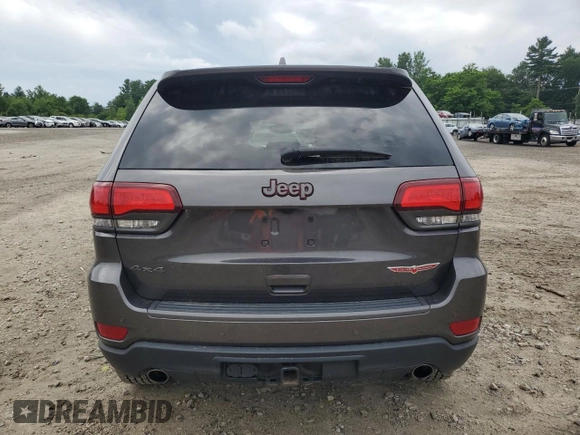 2018 Jeep Grand Cherokee Trailhawk with VIN 1C4RJFLG1JC264781, listed as a Copart auction lot 61524135 with 82,786 mi miles and Salvage title. Bid and sale history available at DreamBid. Image 6.