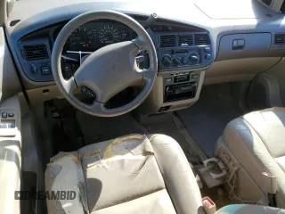 1999 Toyota Sienna LE with VIN 4T3ZF13C0XU144476, listed as a Copart auction lot 48185235 with 183,940 mi miles and Salvage title. Bid and sale history available at DreamBid. Image 8.