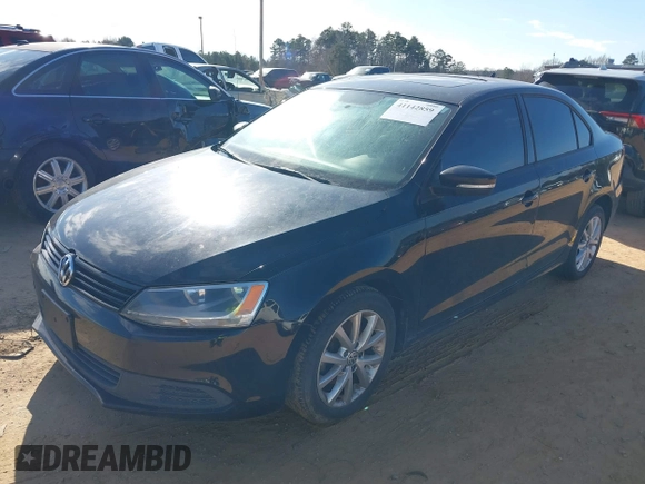 2012 Volkswagen Jetta Sedan SE w/Convenience with VIN 3VWDX7AJ5CM346105, listed as a IAAI auction lot 41142859 with 208,923 mi miles. Bid and sale history available at carsss.com. Image 2.